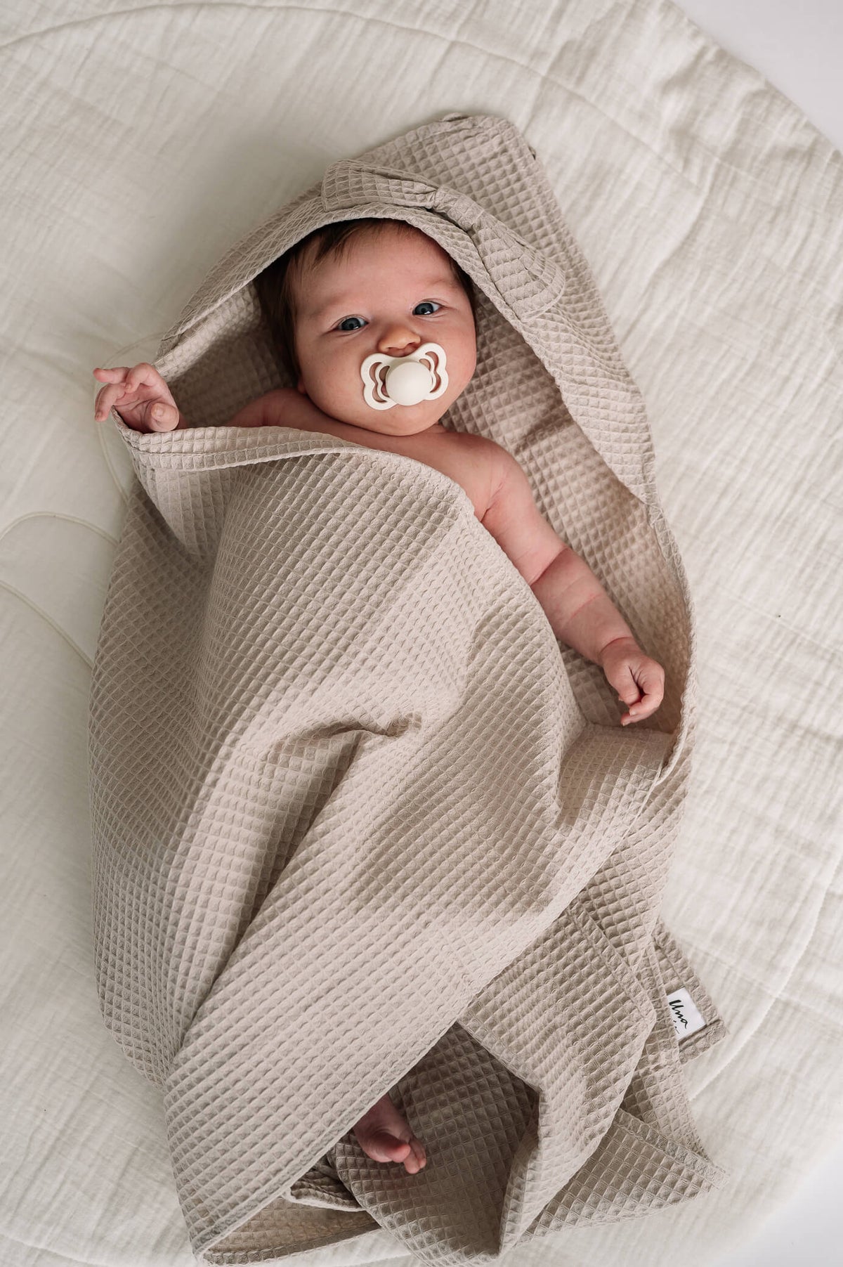 Tuotekuva_huppupyyhe_rusetilla_light_beige.jpg